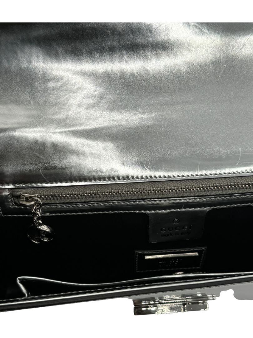 Gucci Metallic Silver Leather Clutch